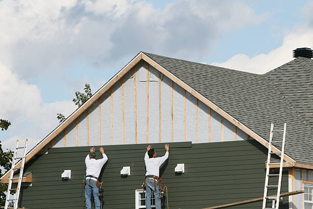 Professional Siding Installation technician working in Hood, VA